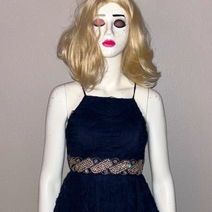 NAVY HALTER TOP DRESS WITH GOLD STUDDED WAIST